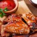 Συνταγή για φτερούγες κοτόπουλου στο air fryer με μέλι και σουσάμι