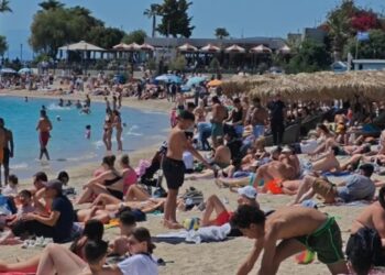 It smelled like summer in the southern suburbs – Athenians and tourists filled the beaches