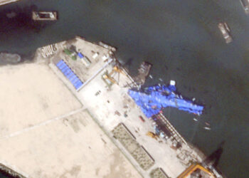 How Kim’s pride sank: Satellite images reveal the damage to the destroyer after failed launch